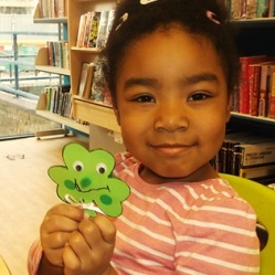 Making shamrock faces for St Patrick's Day 2017 at Kensal Library